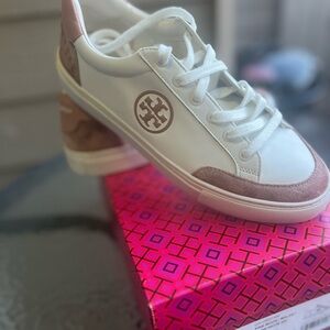 Tory Burch sneaker. Great used condition. Comes with original box.